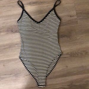 Black and white striped body suit
